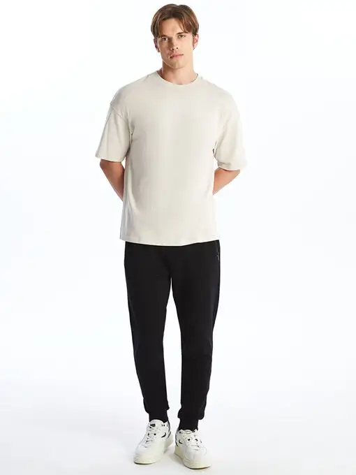 picture شلوار پیاده روی ال سی وایکیکی با کد W42327Z8-J0F ( Slim Fit Erkek Jogger Eşofman Altı )