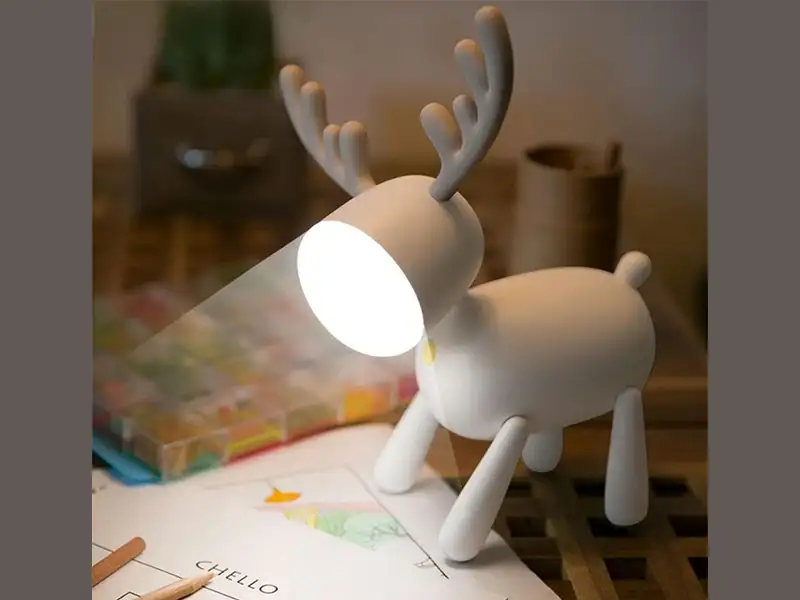 picture چراغ رومیزی سیلکونی فانتزی شارژی طرح گوزن L17 Cartoon deer small night light USB charging